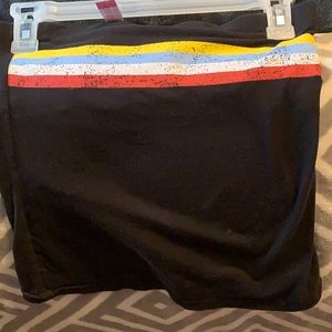 Black crop with yellow,blue,white,red stripe